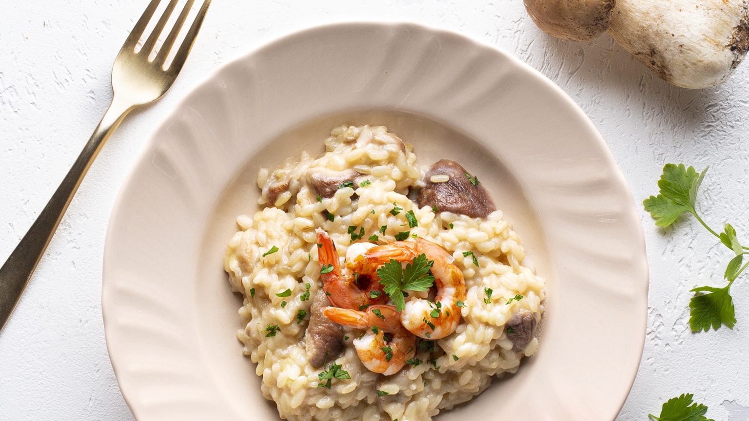 Risotto con porcini e gamberi scottati Riso Flora